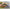 Grub Fishup Mighty Grub 13.3cm, Motor Oil Pepper, 4buc/pac